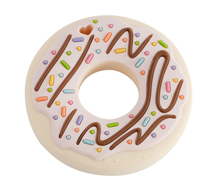 Silicone doughnut baby teether.  Cute Baby Teething Toys | Stylish baby toys featured on Babies, Love, & Lattes a motherhood and lifestyle blog by popular North Carolina blogger, Jessica Linn.
